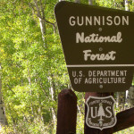 gunnison park sign with aspens